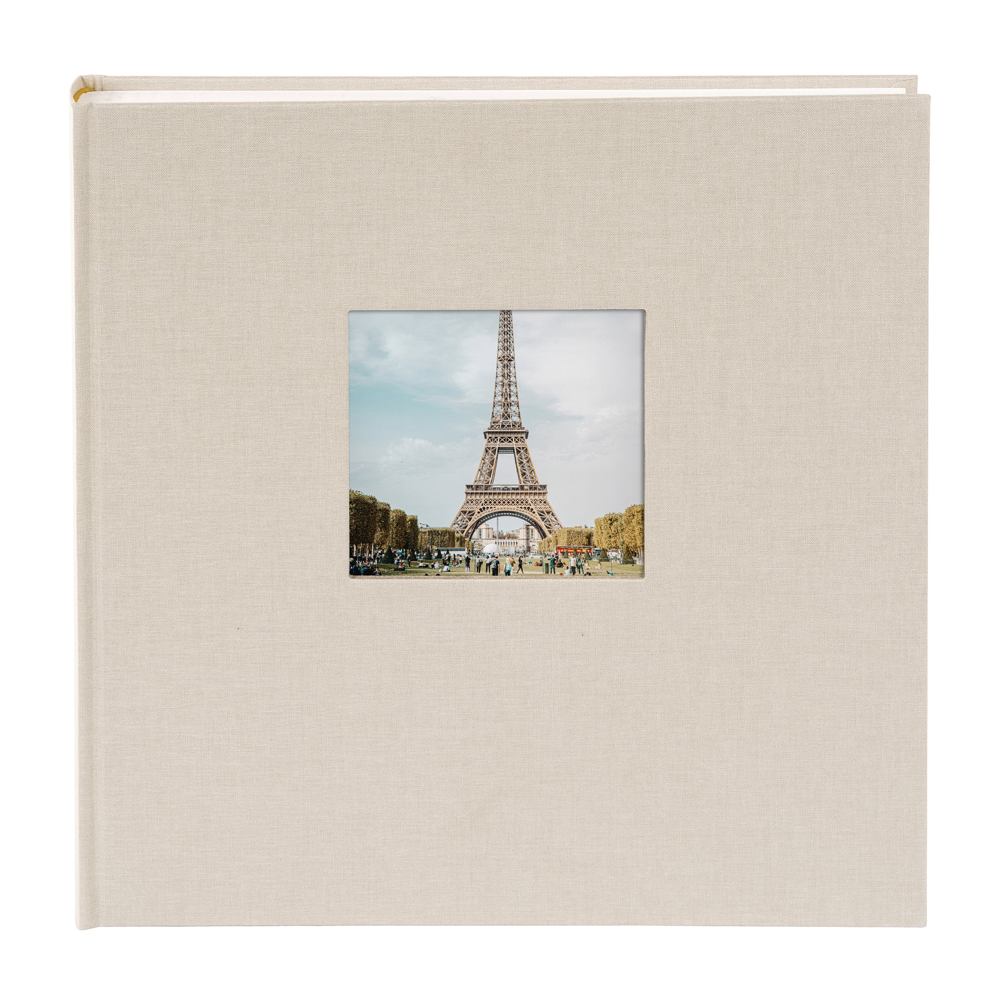 A Goldbuch sandgrey photo album with a cover illustration of the Eiffel tower, showcasing its hardcover design and white pages.