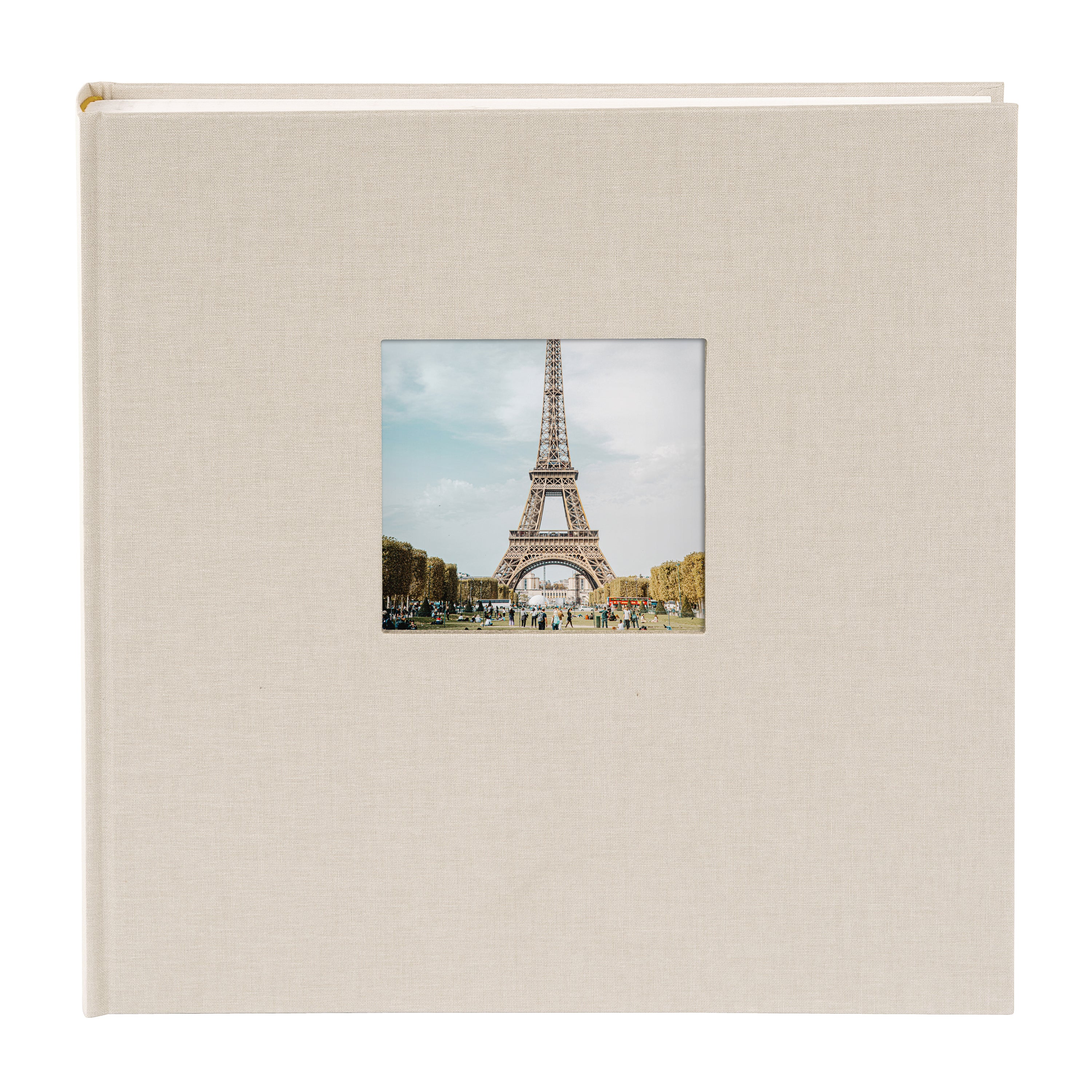 A Goldbuch sandgrey photo album with a cover illustration of the Eiffel tower, showcasing its hardcover design and white pages.