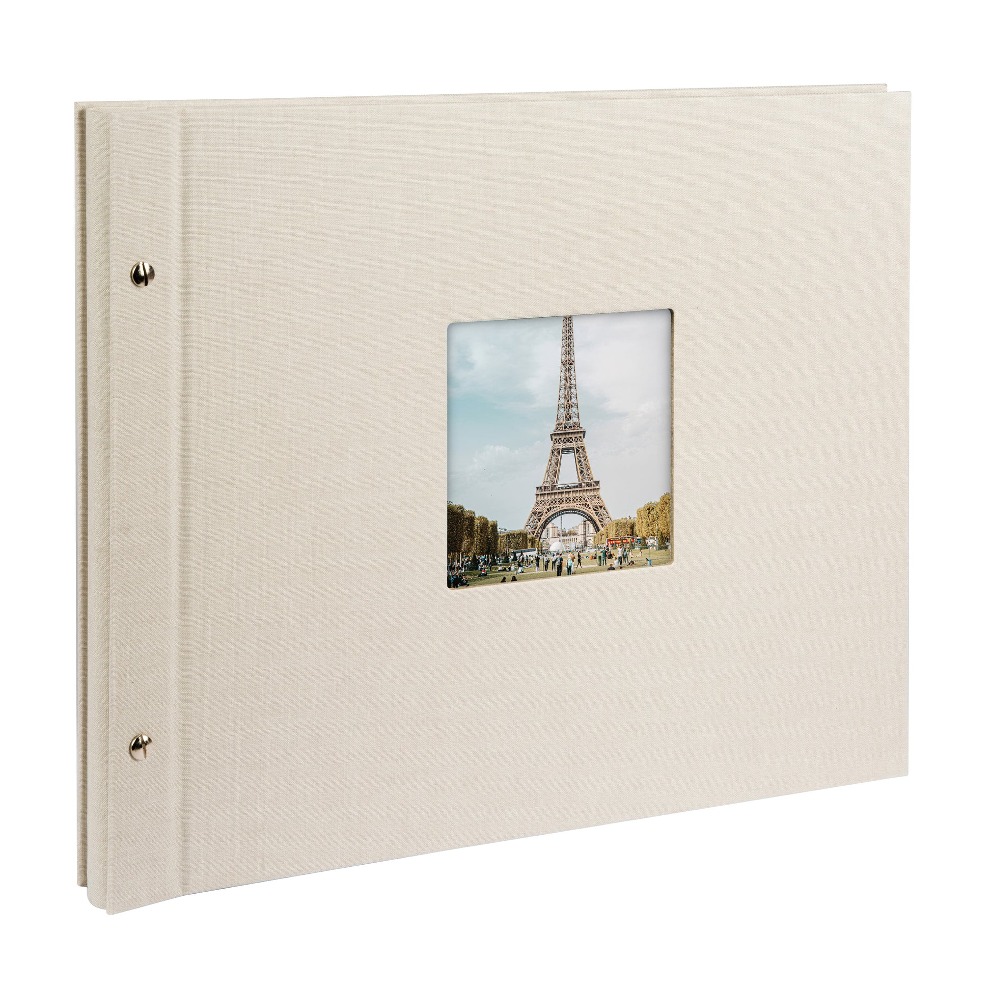 A Goldbuch sandgrey photo album with a cover illustration of the Eiffel tower, showcasing its hardcover design and black pages.