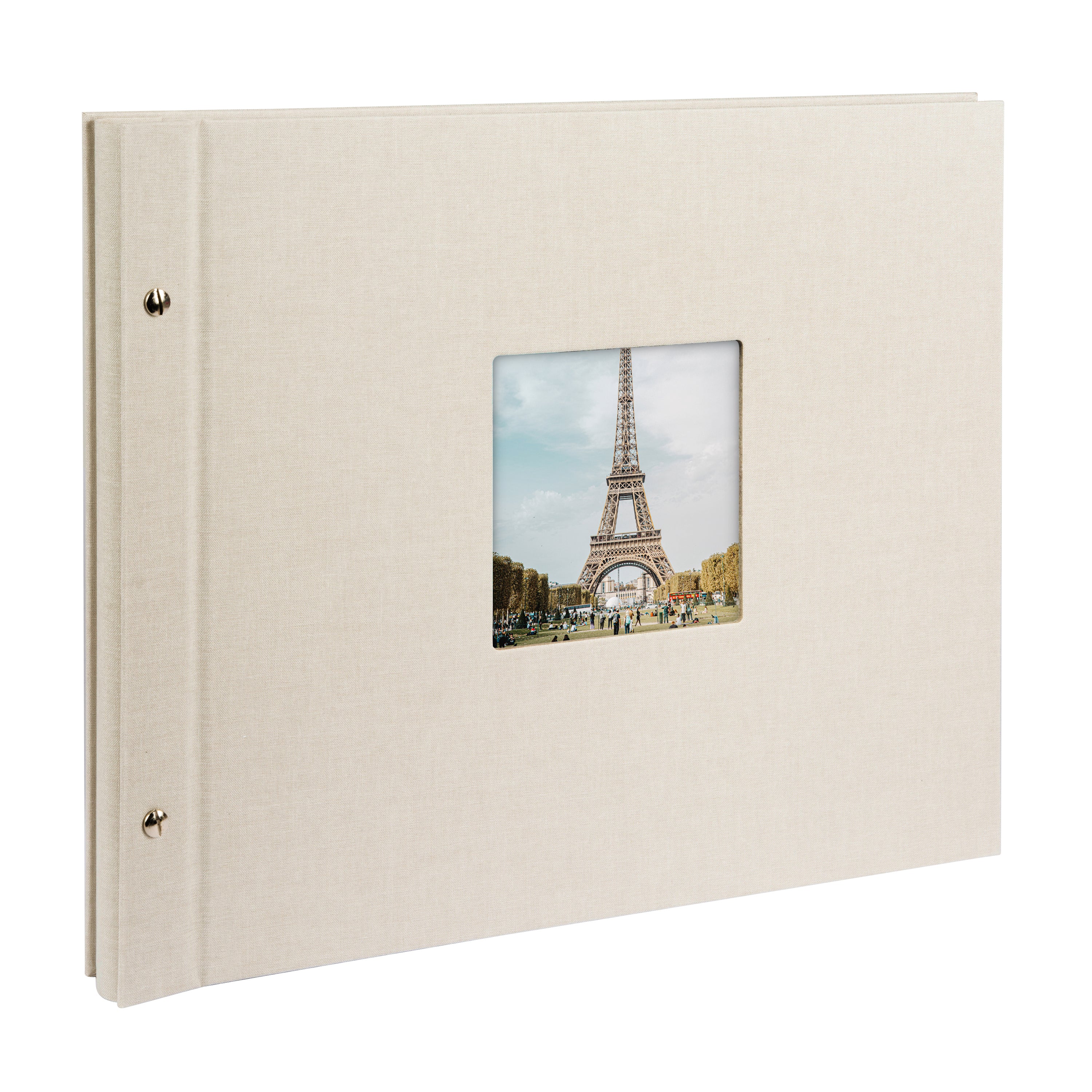 A Goldbuch sandgrey photo album with a cover illustration of the Eiffel tower, showcasing its hardcover design and black pages.
