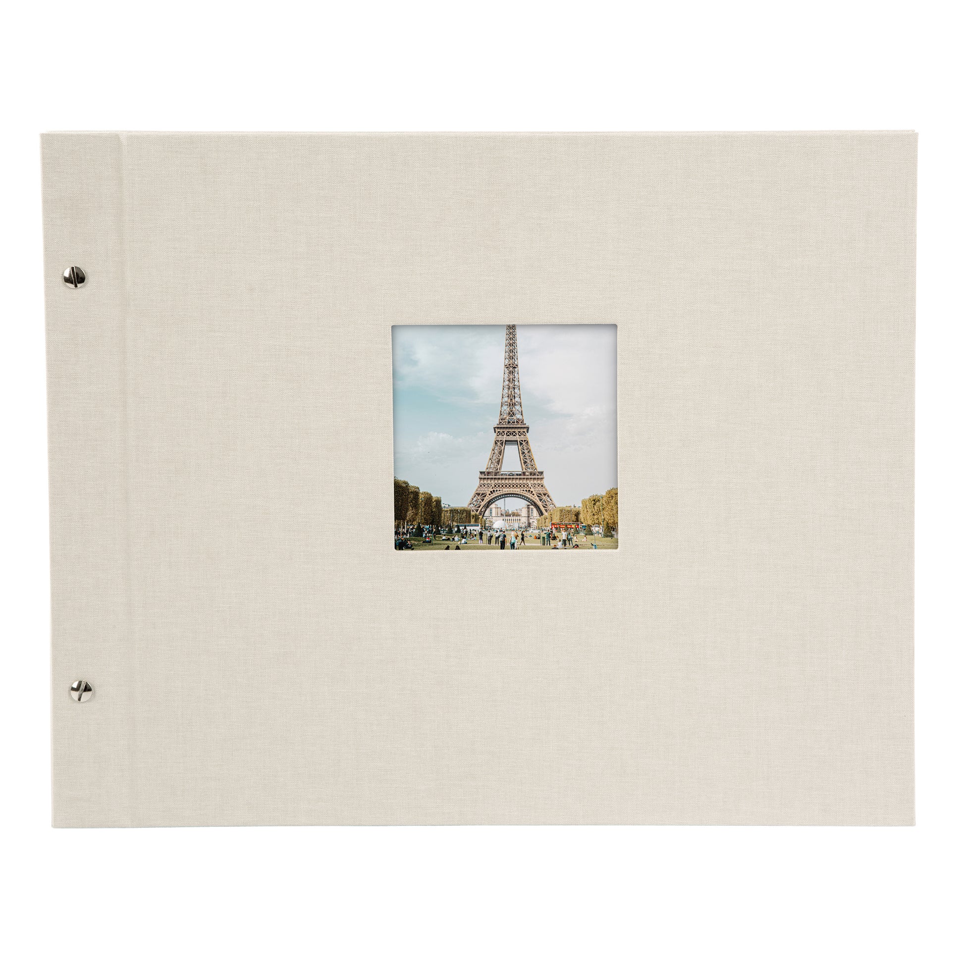 A Goldbuch sandgrey photo album with a cover illustration of the Eiffel tower, showcasing its hardcover design and black pages.