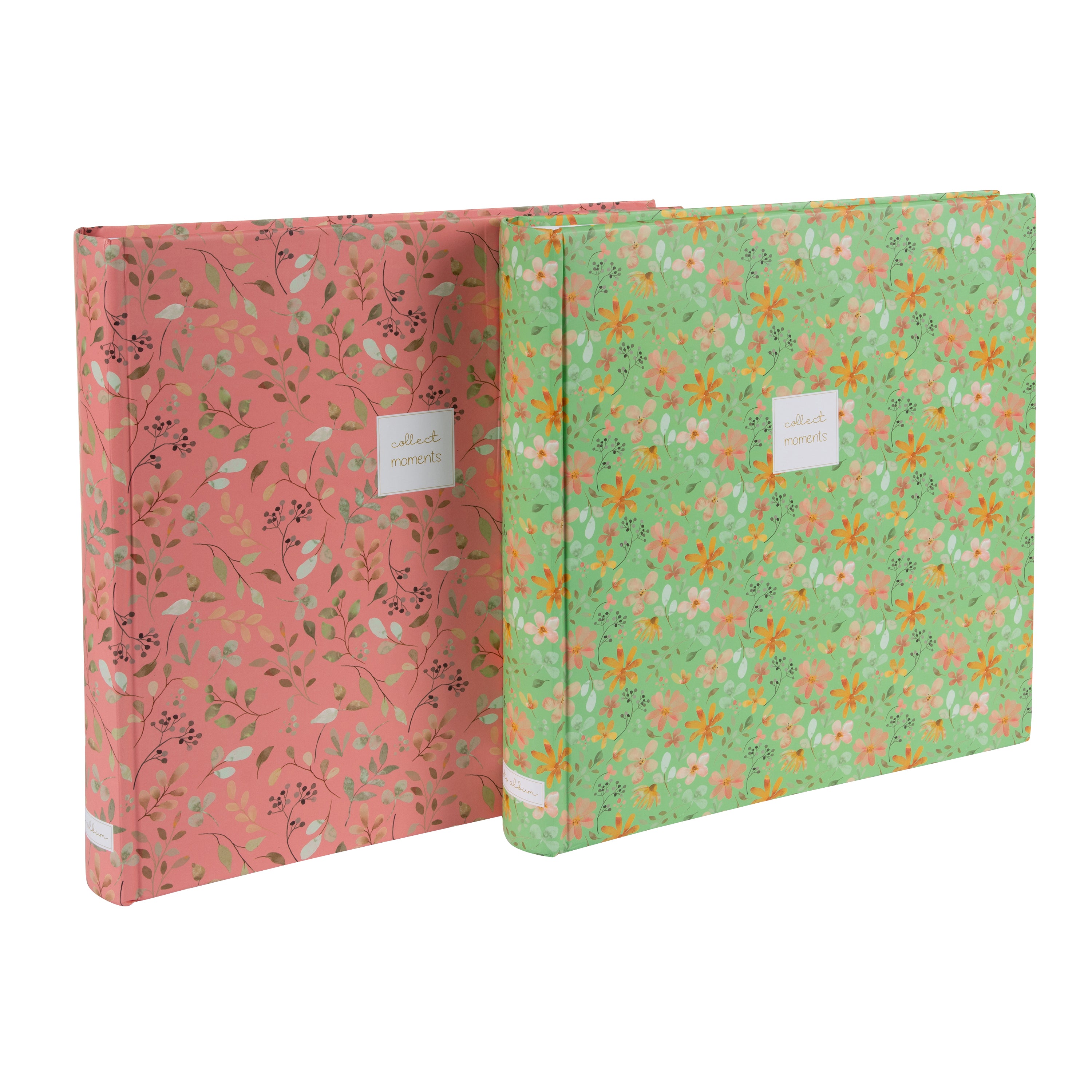 Goldbuch floral photo albums in pink and green, featuring a white label, arranged on a surface, resembling a photo album.