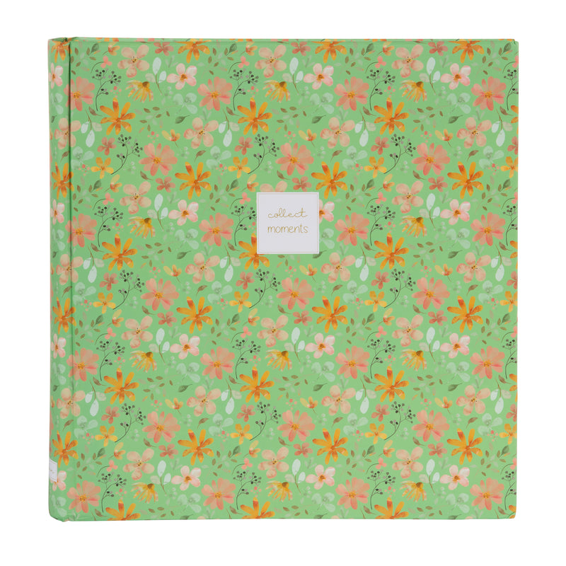 Goldbuch floral photo albums in pink and green, featuring a white label, arranged on a surface, resembling a photo album.