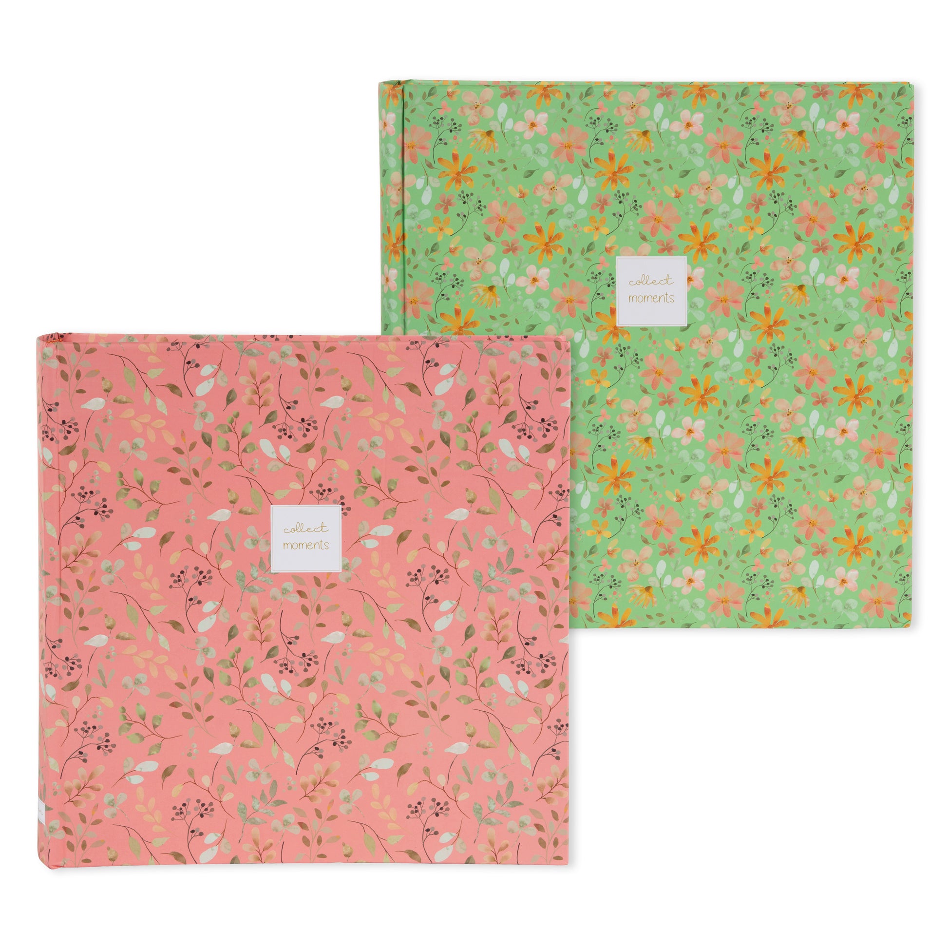 Goldbuch floral photo albums in pink and green, featuring a white label, arranged on a surface, resembling a photo album.