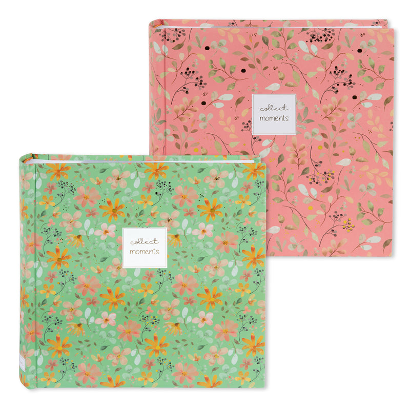 Goldbuch floral photo albums in pink and green, featuring a white label, arranged on a surface, resembling a photo album.