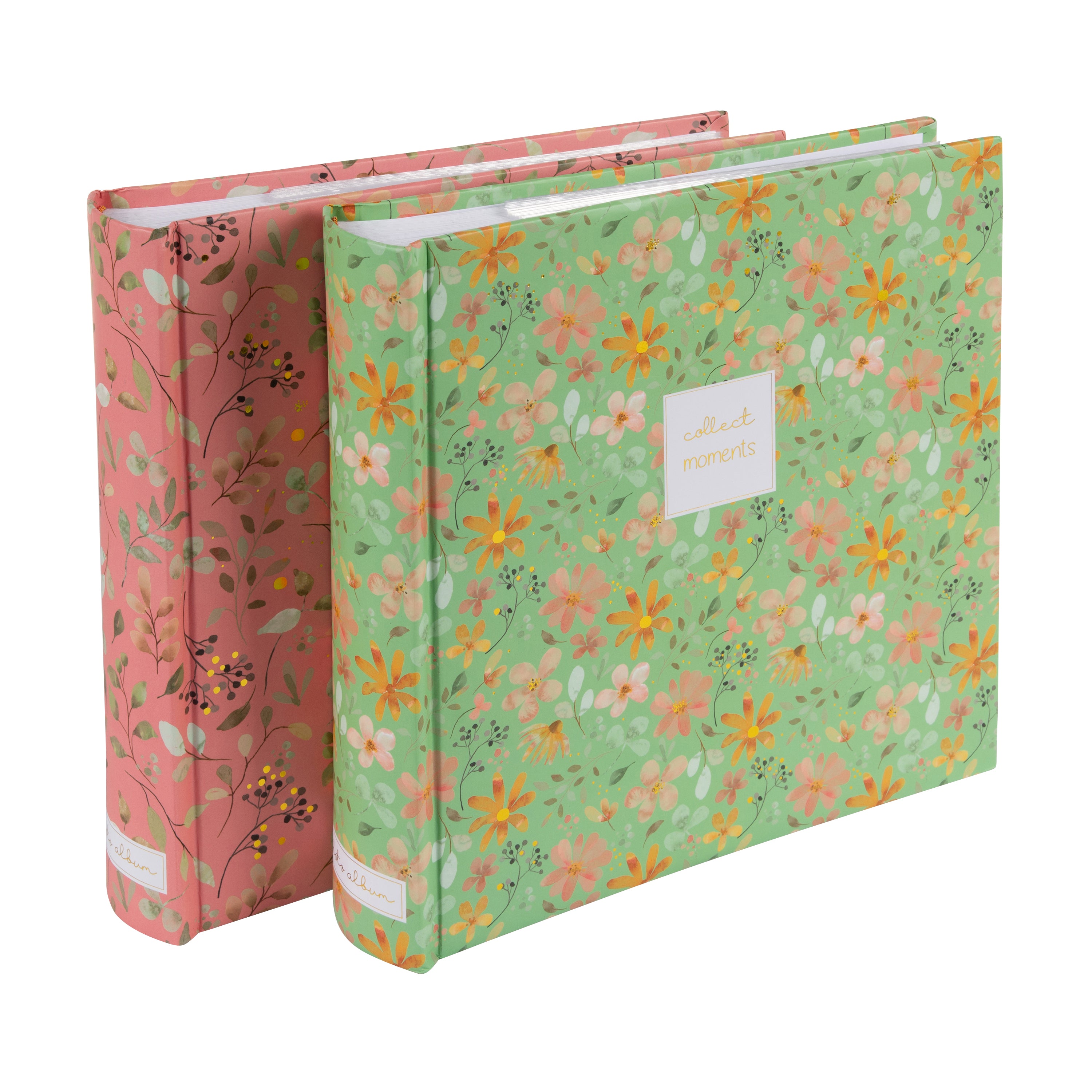Goldbuch floral photo albums in pink and green, featuring a white label, arranged on a surface, resembling a photo album.