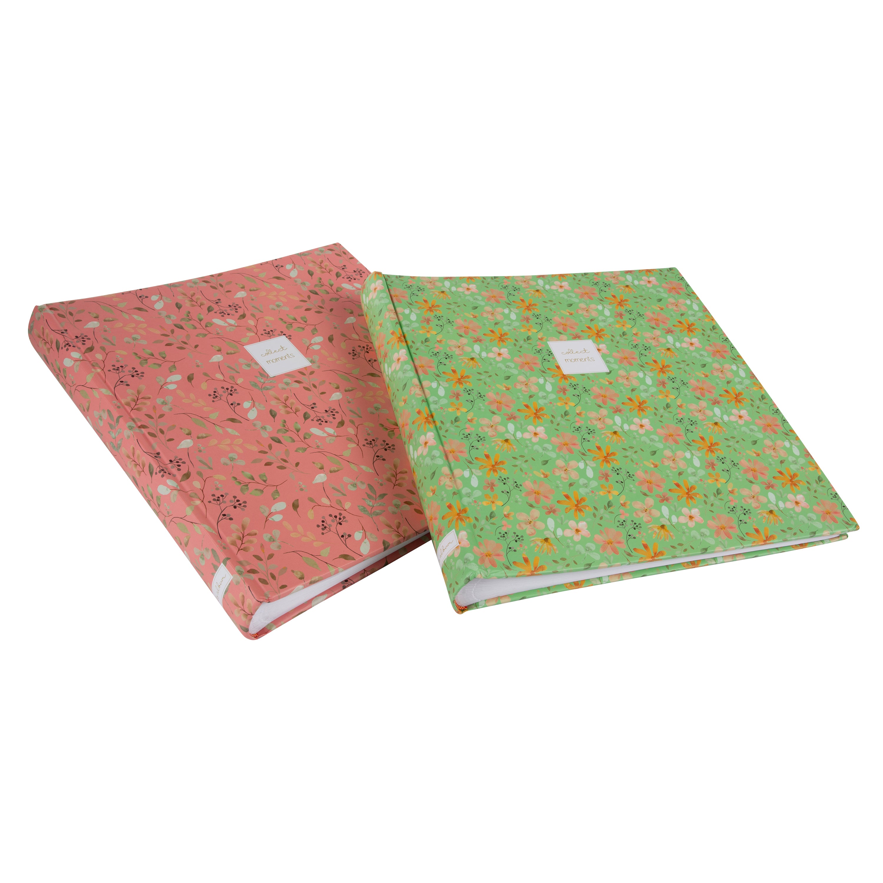 Goldbuch floral photo albums in pink and green, featuring a white label, arranged on a surface, resembling a photo album.