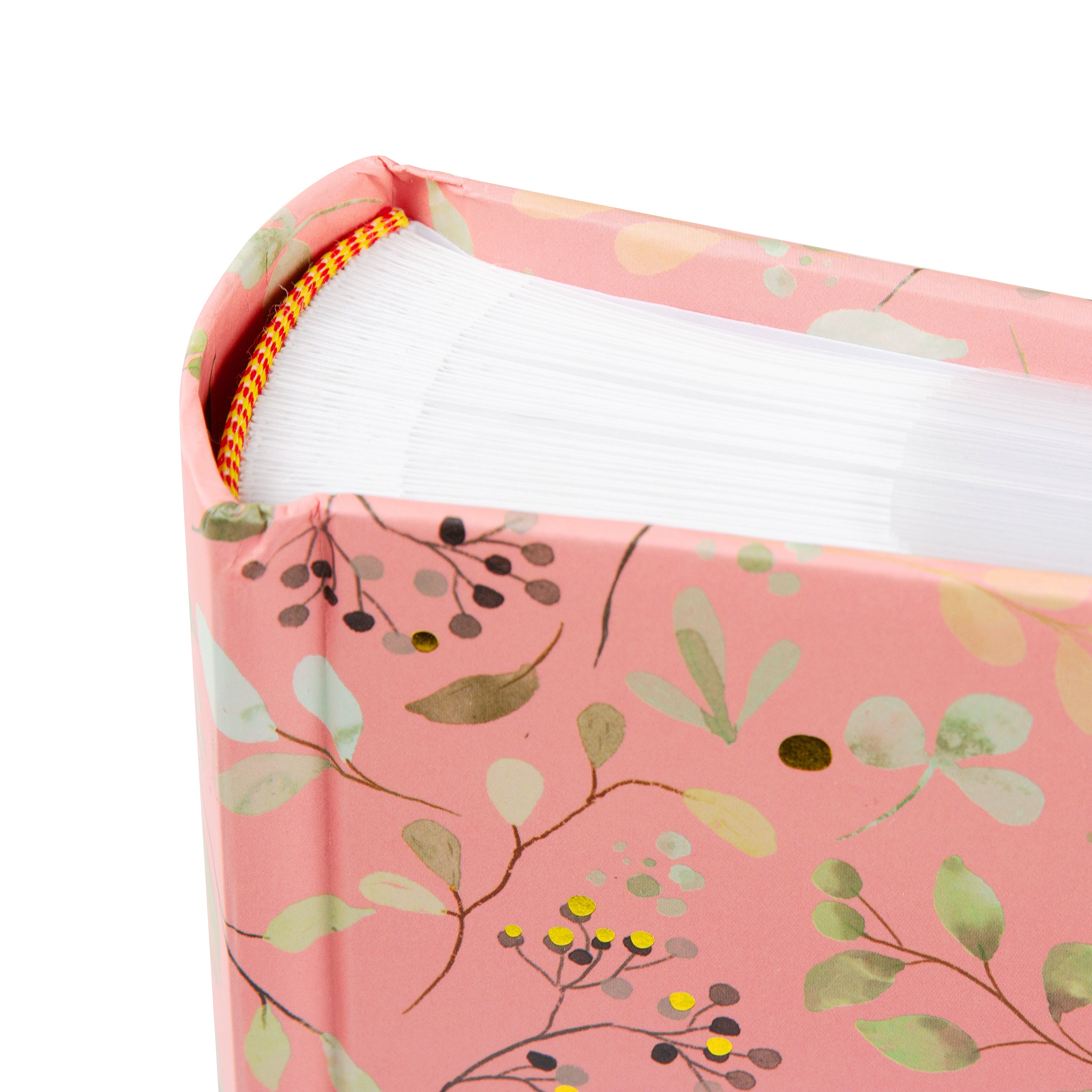 Goldbuch floral photo albums in pink and green, featuring a white label, arranged on a surface, resembling a photo album.