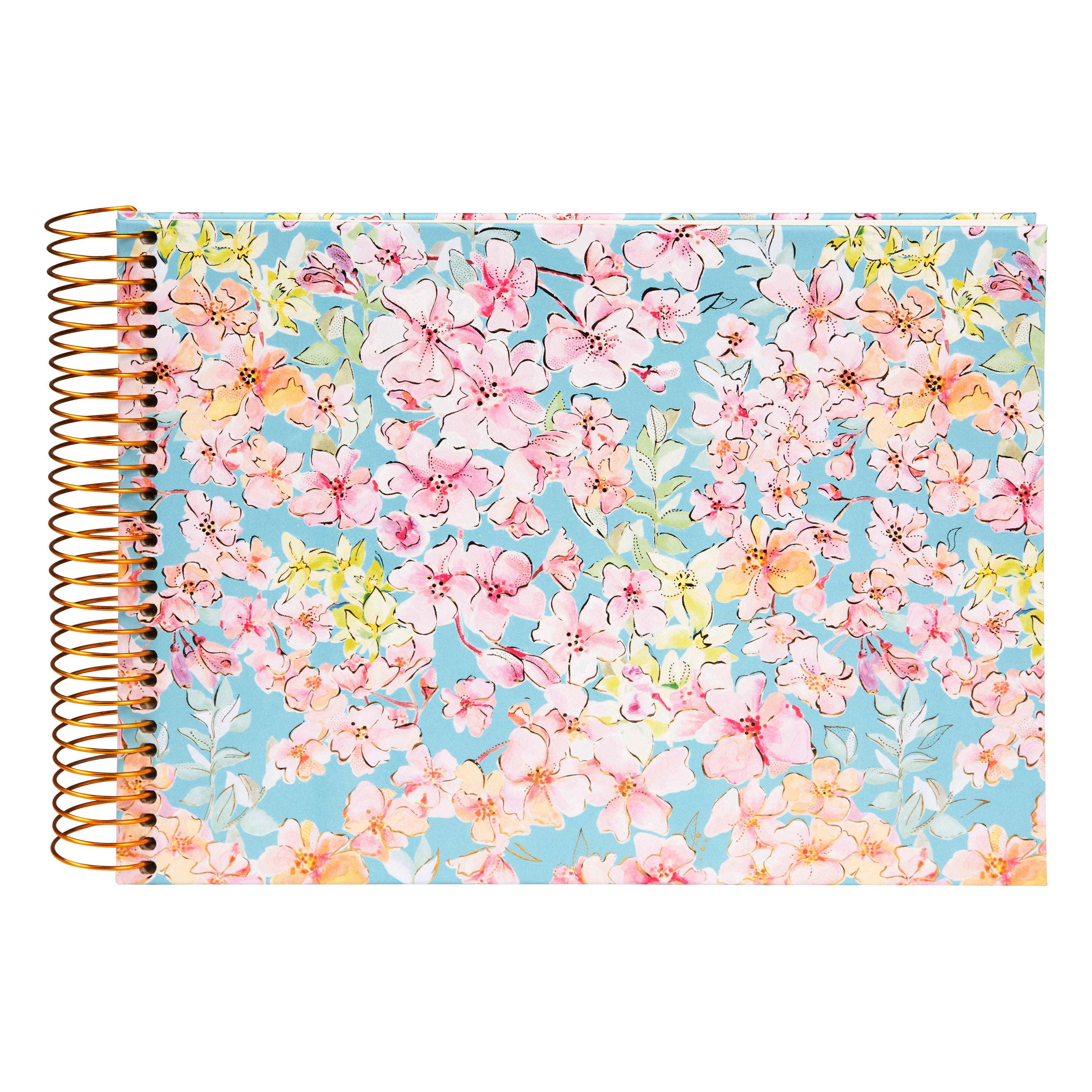 A spiral Goldbuch photo album, adorned with pink and blue flowers.
