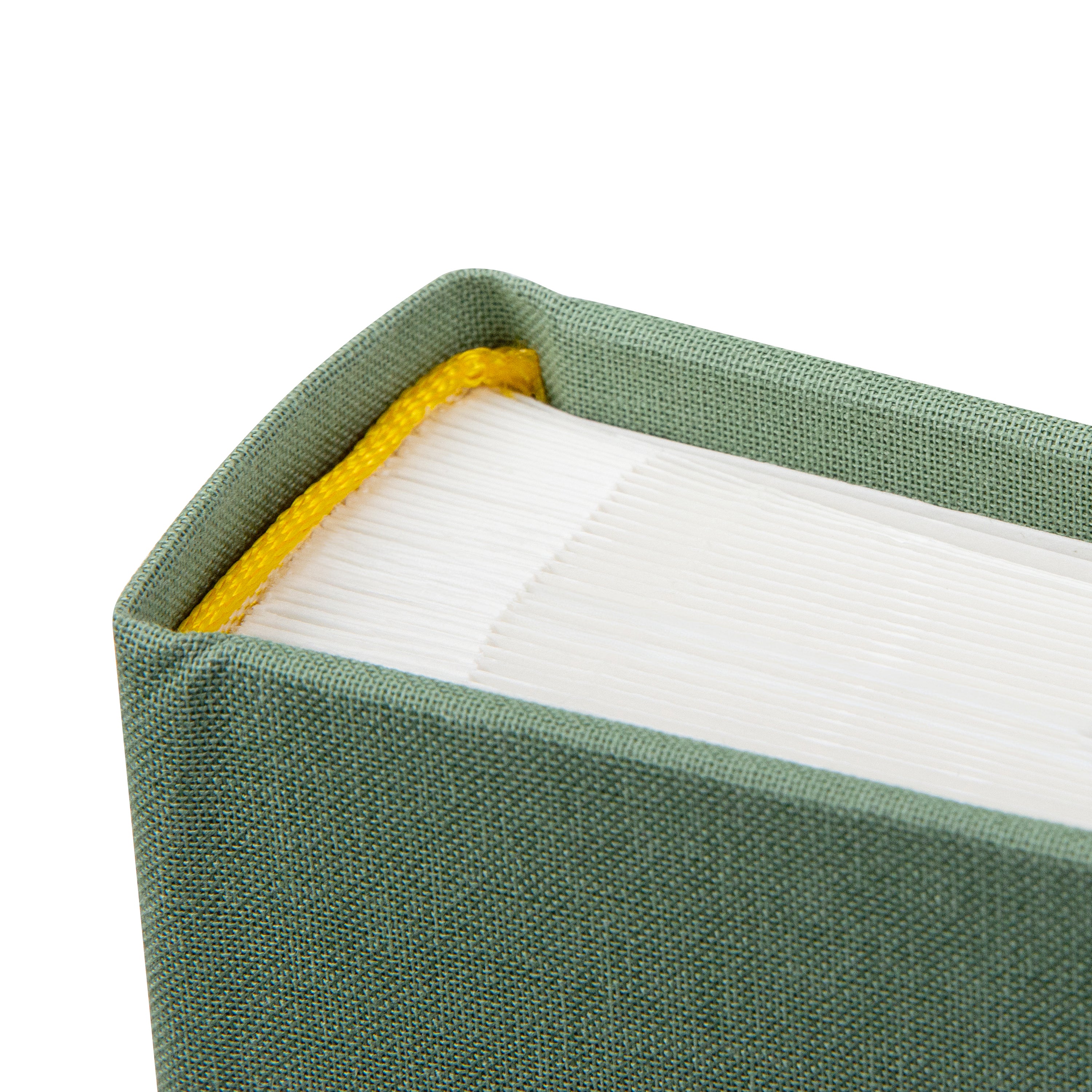 Goldbuch green photo album with a cutout featuring a couple and a heart symbol on a white background