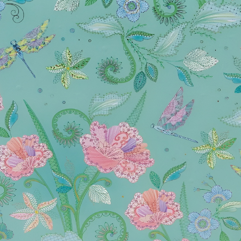 A vibrant green Goldbuch photo album featuring pink flowers and butterflies, indicative of a decorative photo album.