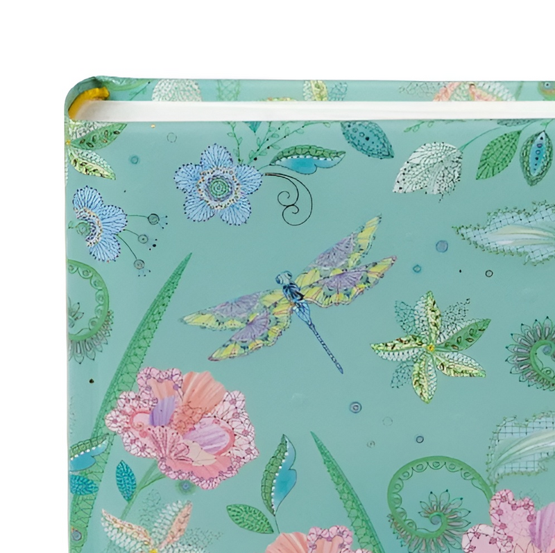 A vibrant green Goldbuch photo album featuring pink flowers and butterflies, indicative of a decorative photo album.