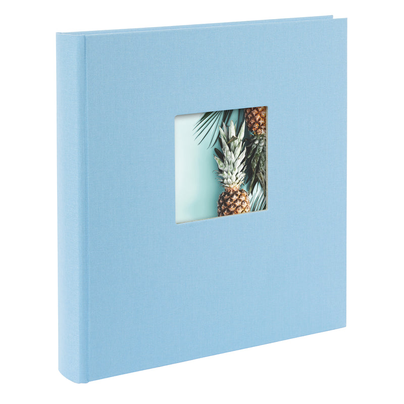 An elegant sky blue Goldbuch photo album with black pages, with a pineapple on its cover