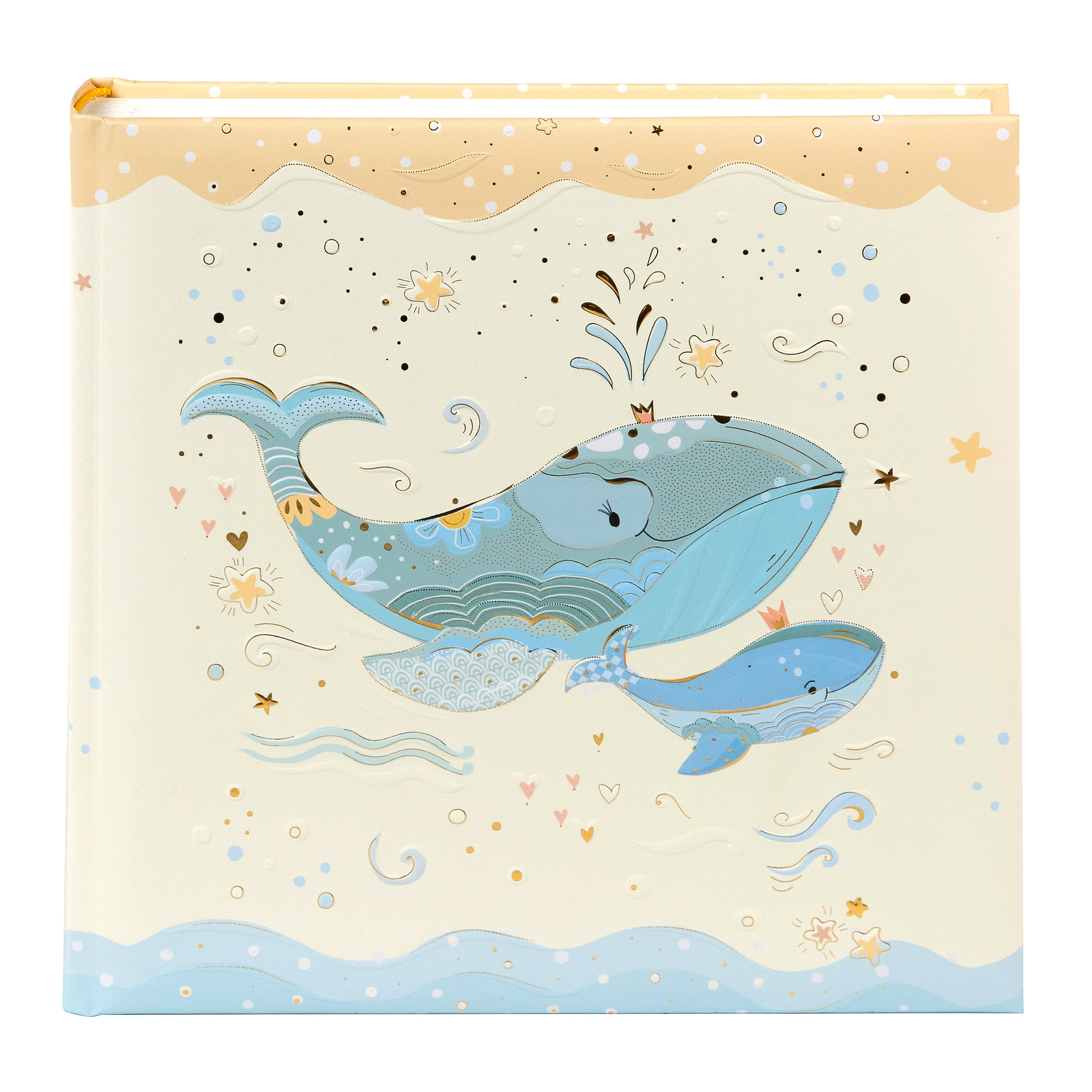 Goldbuch photo album with an illustrated cover showing two blue whales, one large and one small, swimming among stars and waves on a cream and beige background.