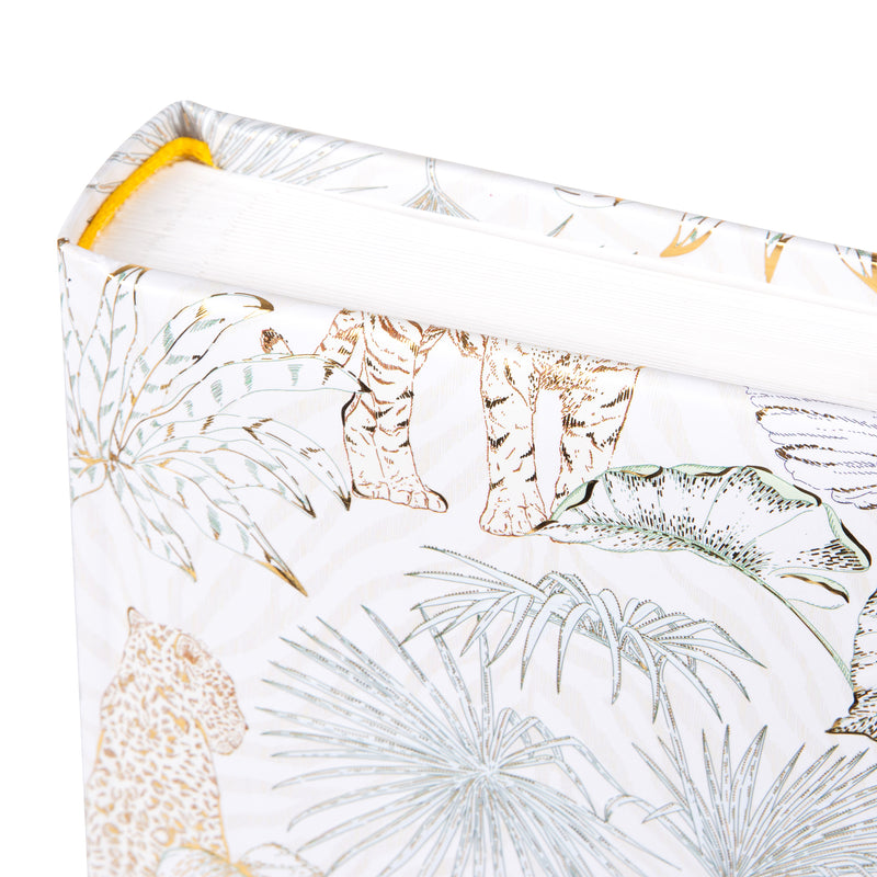 A white and beige patterned Goldbuch photo album featuring animals and plants.
