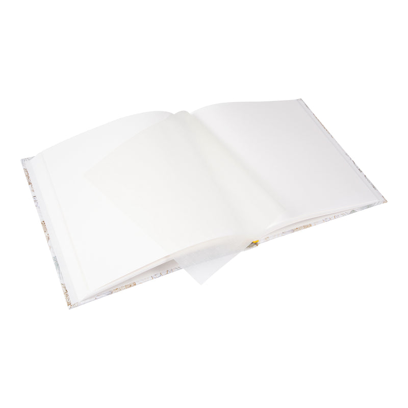 A white and beige patterned Goldbuch photo album featuring animals and plants.
