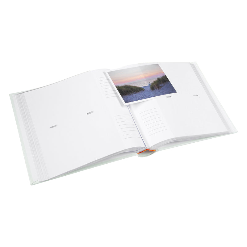 Goldbuch photo album with bicycles and flowers on a light blue background