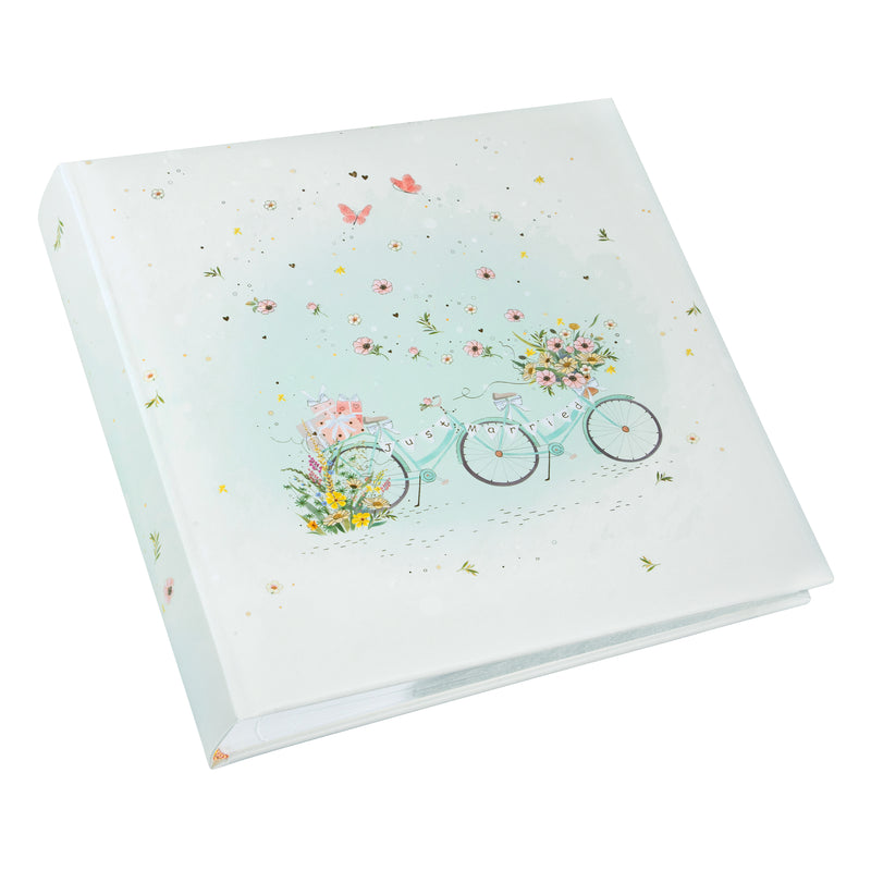 Goldbuch photo album with bicycles and flowers on a light blue background