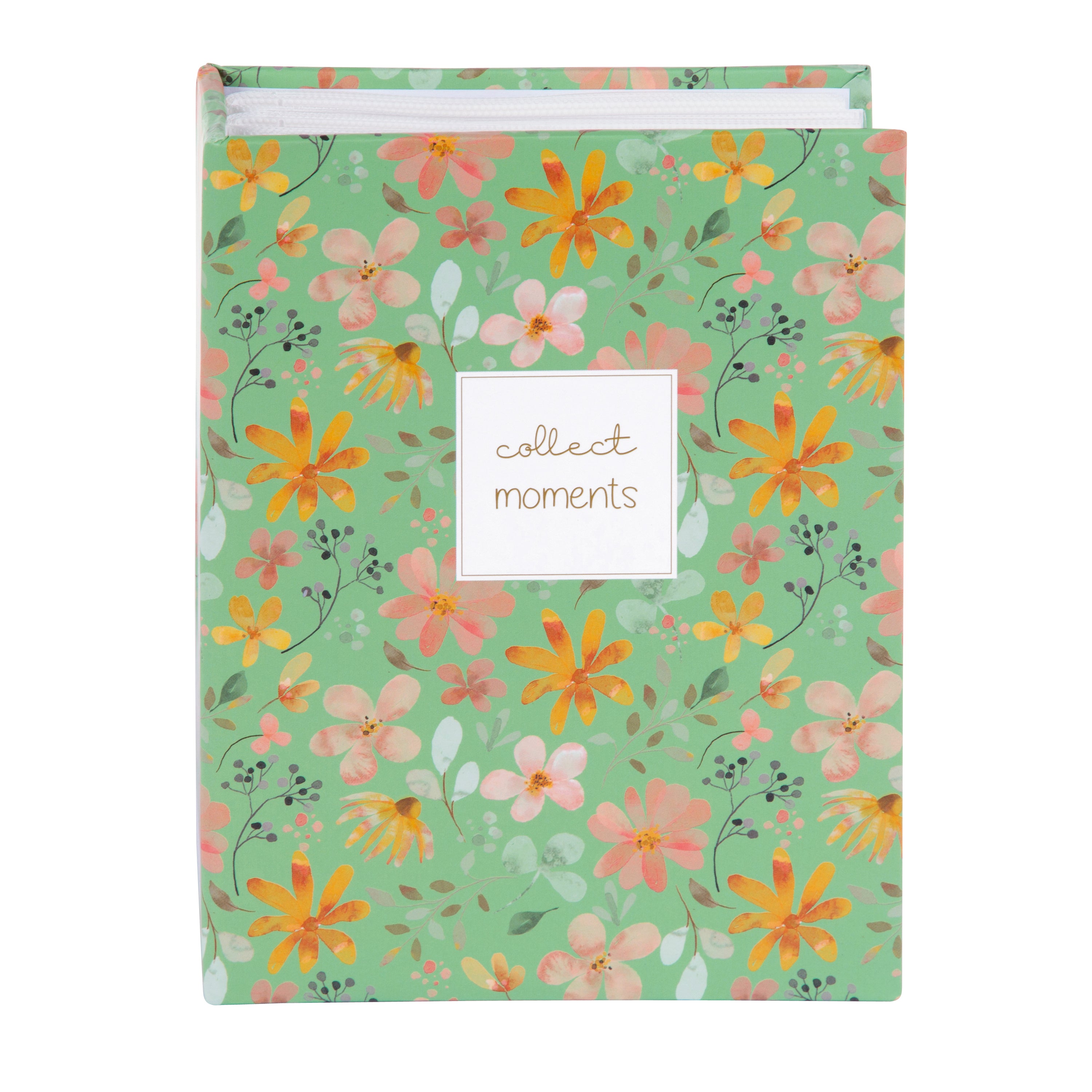 A Goldbuch photo albums with floral patterns and a decorative note card with collect moments text.