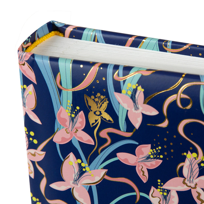 Floral-patterned Goldbuch photo album with pink flowers and gold accents on a blue background