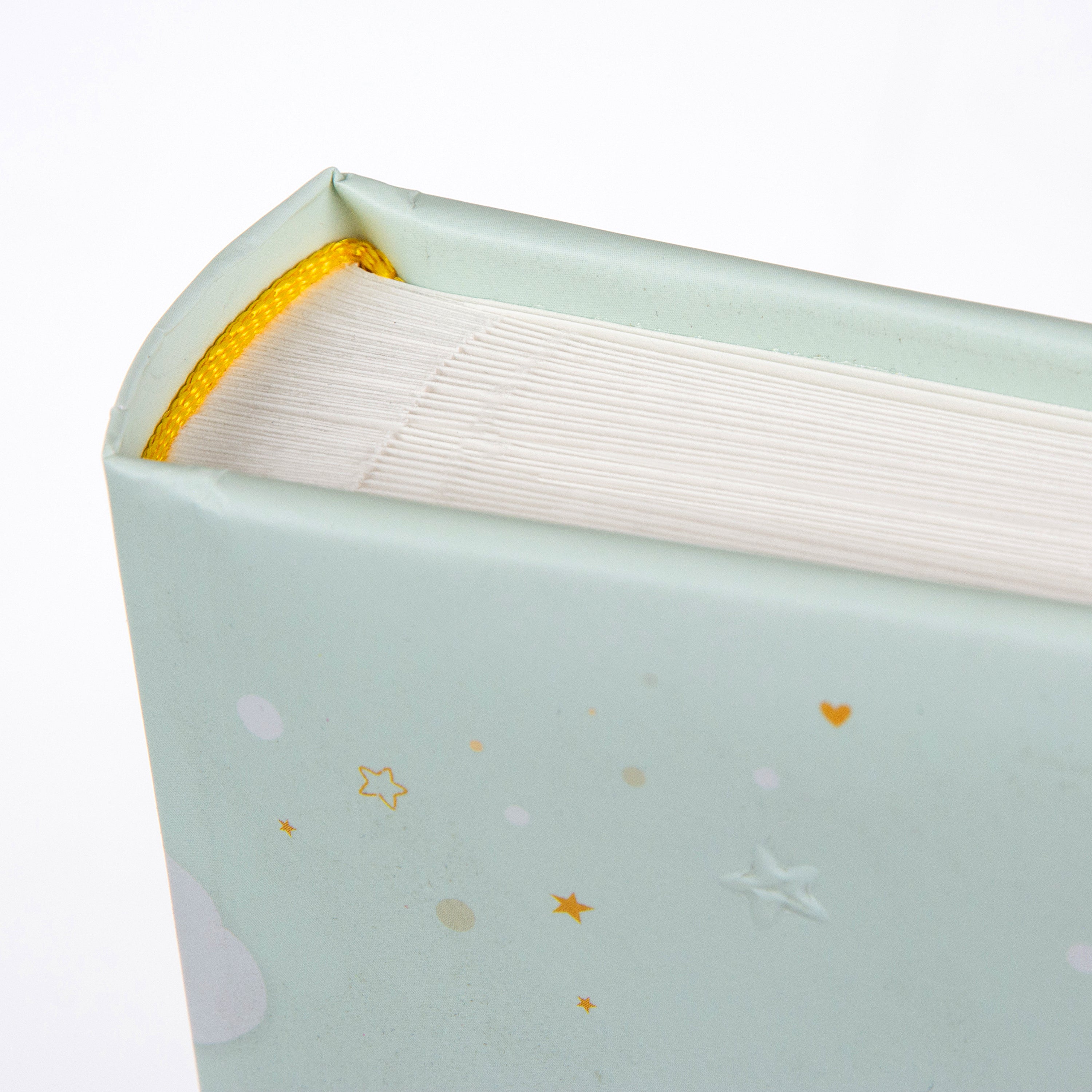 Goldbuch baby photo album showcasing a cheerful bunny and a vibrant rainbow on its cover, perfect for capturing memories.