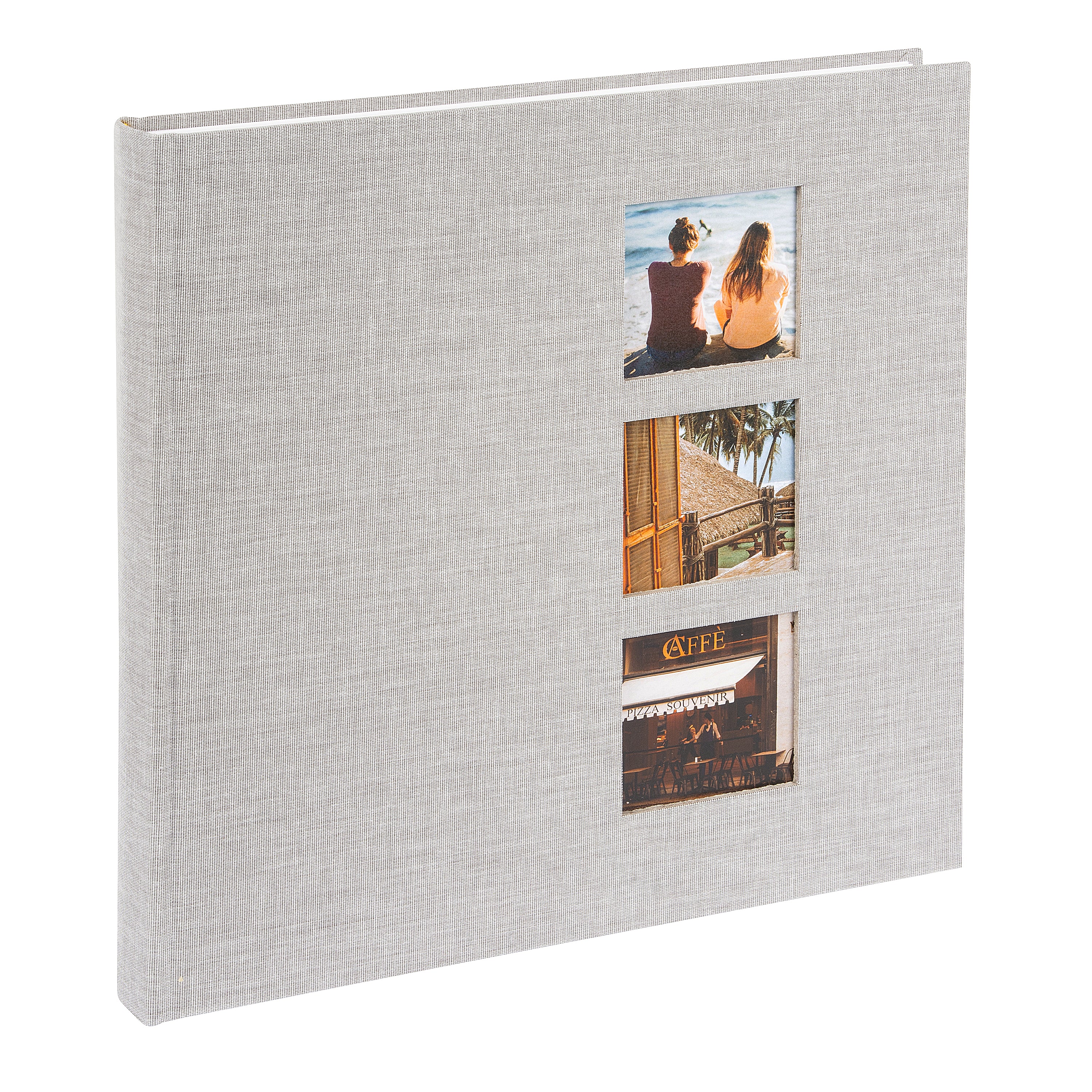 A grey Goldbuch photo album with three photographs showcased on its surface.