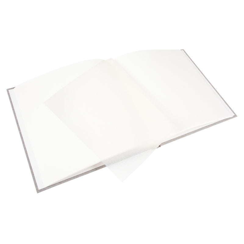 A grey Goldbuch photo album with three photographs showcased on its surface.