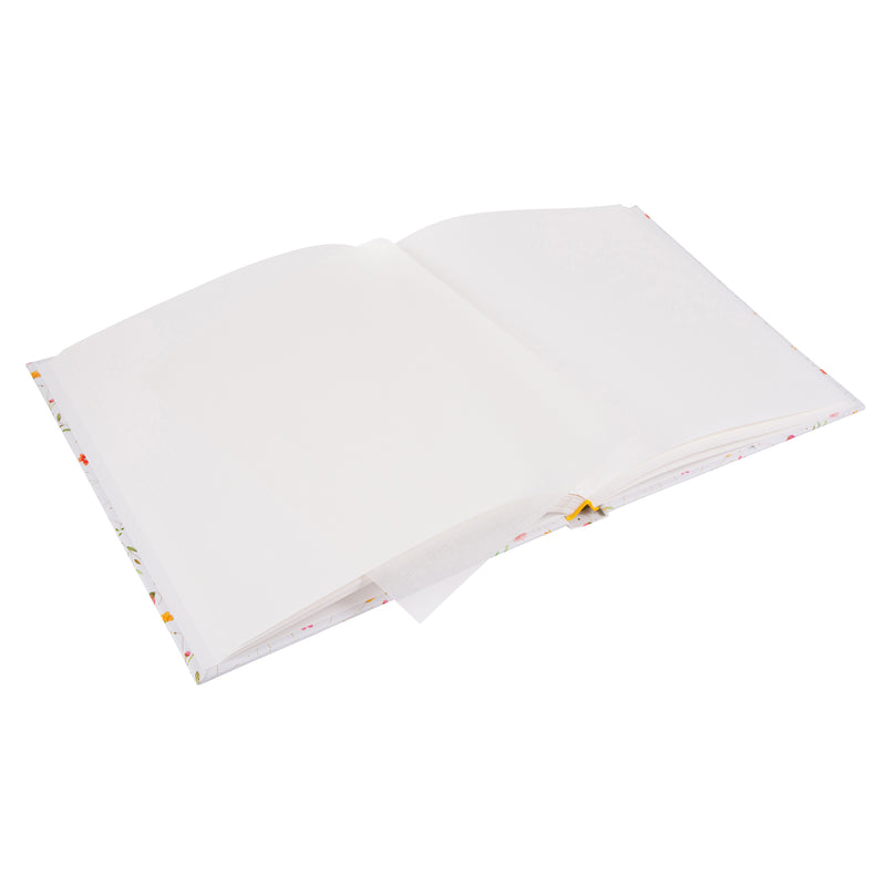 A white Goldbuch photo album adorned with colorful flowers and butterflies on the cover.