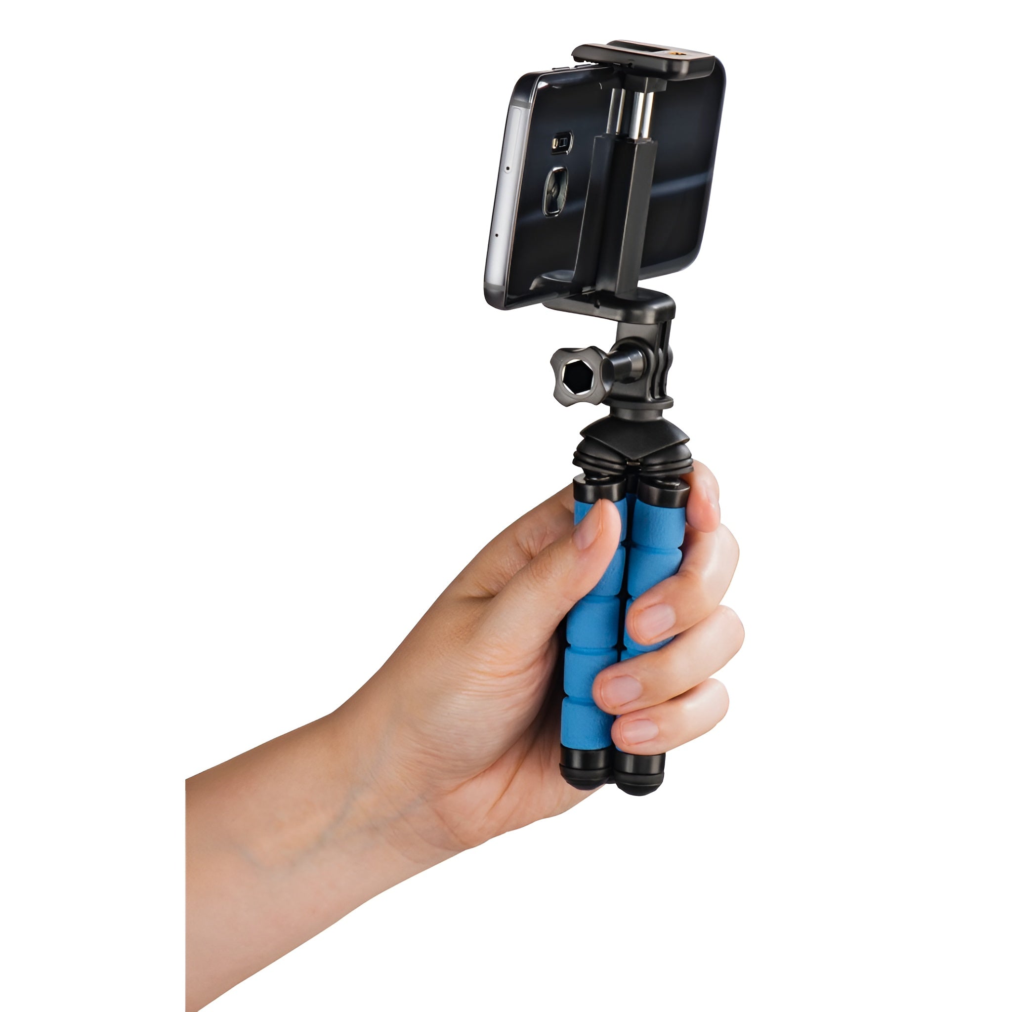 A Hama tripod supporting a camera, positioned for photography, showcasing stability and professional equipment.