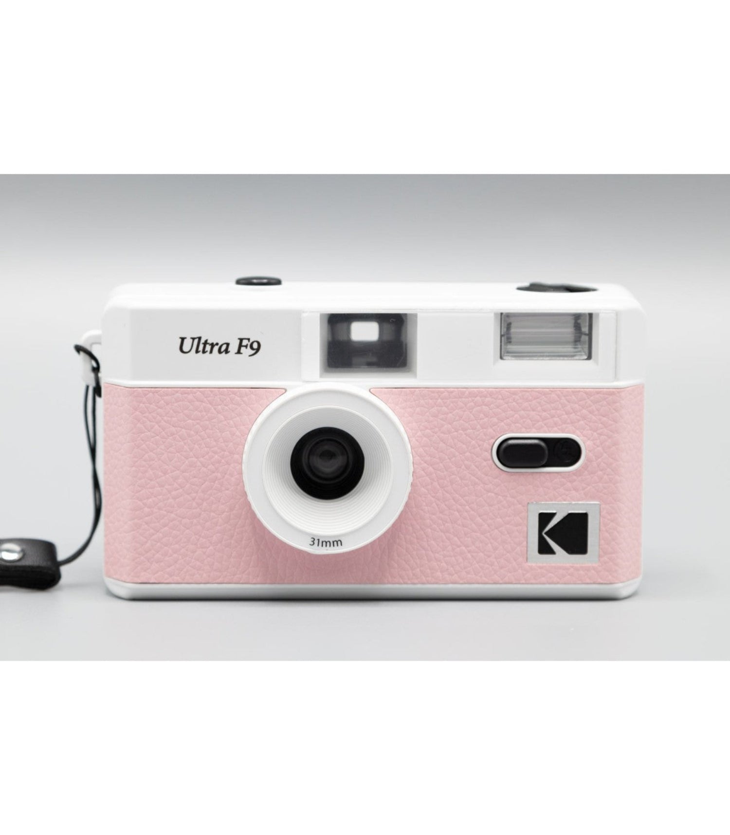 Pink and white Kodak Ultra F9 camera on a white background