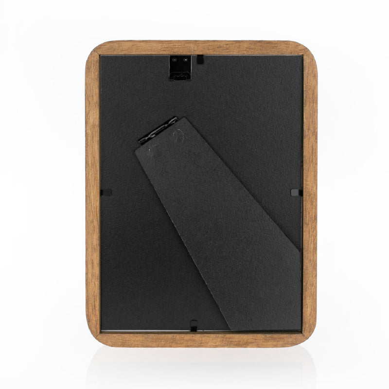A ZEP wooden photo frame displaying a portrait of a woman, elegantly showcasing her image.