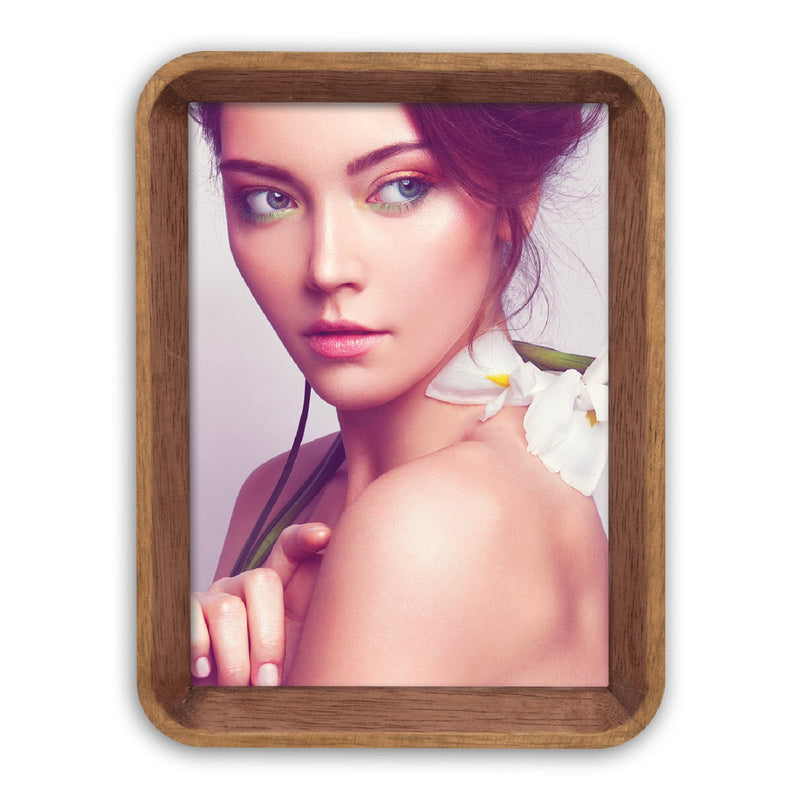 A ZEP wooden photo frame displaying a portrait of a woman, elegantly showcasing her image.