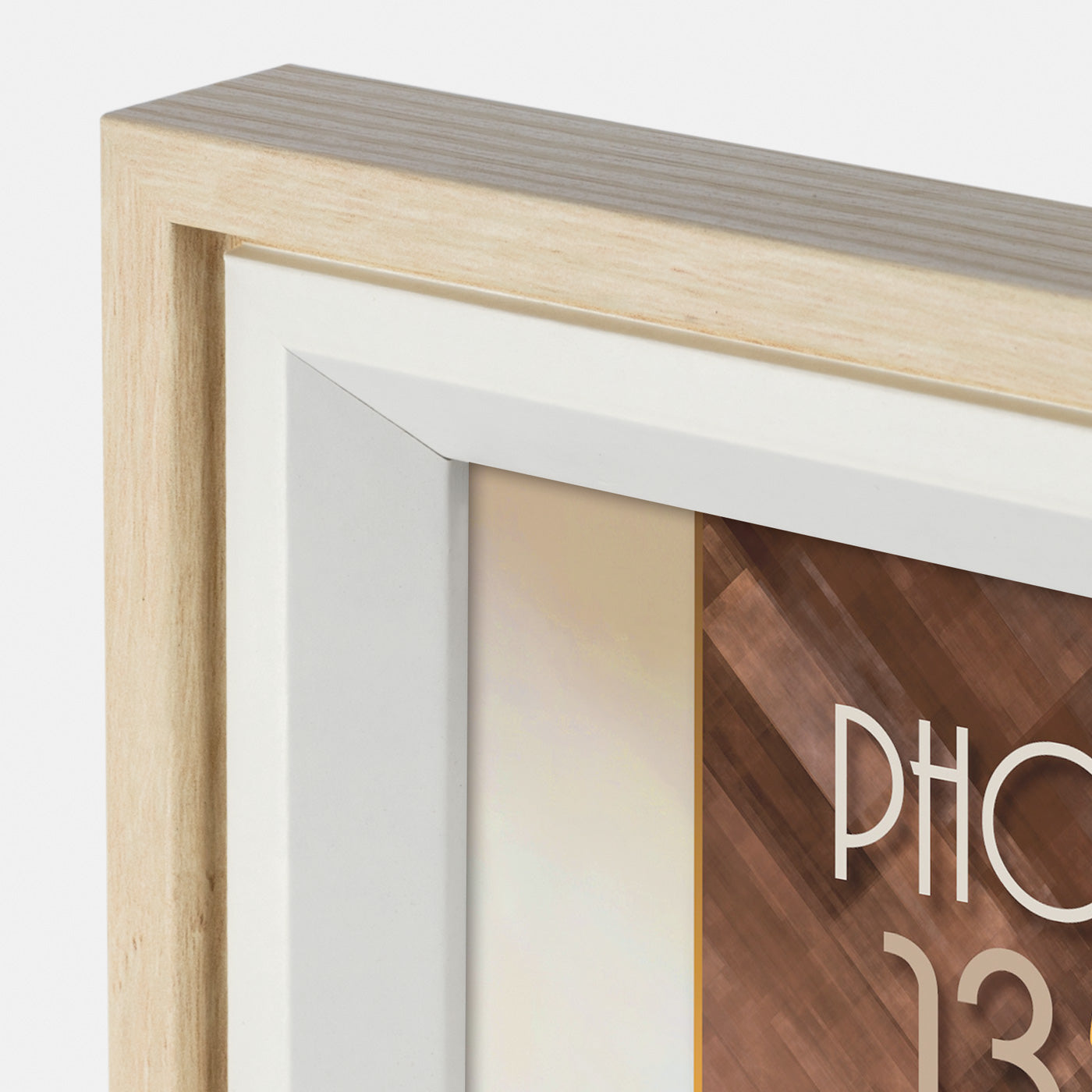 A light natural wood ZEP picture frame with a white mat, showcasing a mockup of a framed photo print. The inner photo features a cozy living room scene with a beige sofa, yellow pillows, a coffee table, and a corgi dog, with a mock text overlay reading 'PHOTO frame'.