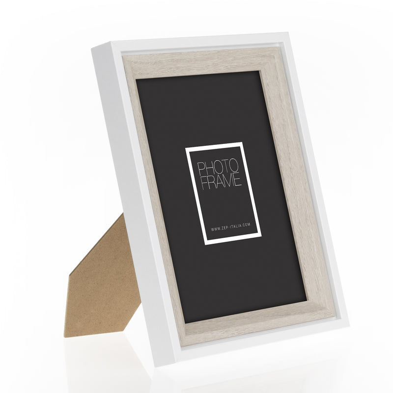 A white rectangular ZEP photo frame shown against a light gray background, containing a mock living room scene with a sofa, table, and a corgi dog. The frame itself is the product being sold, and the interior photo is a demonstration insert.